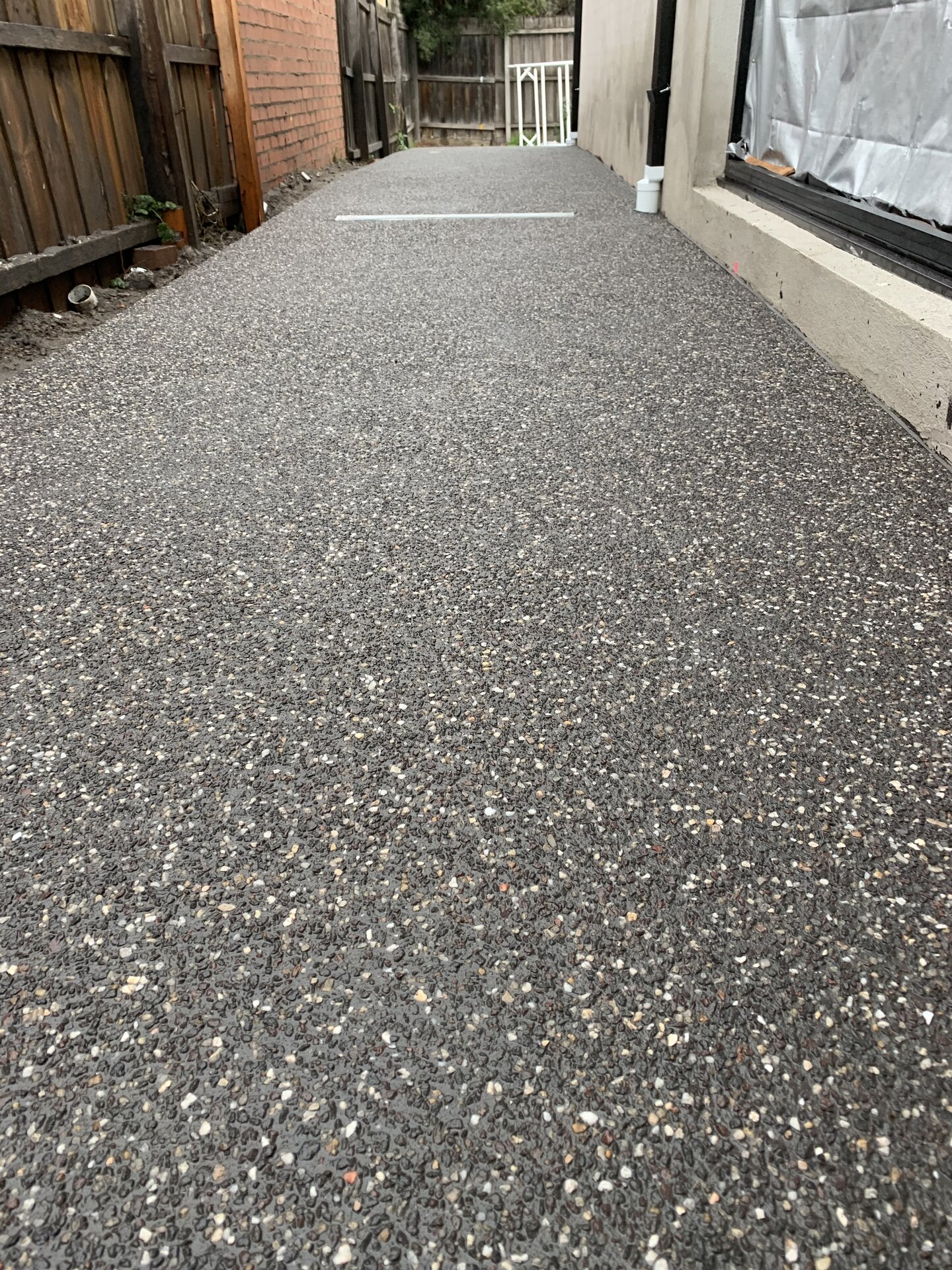 Exposed aggregate side path with timber deck