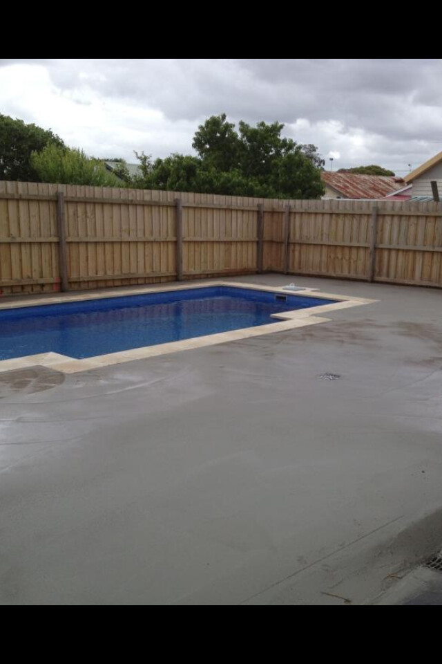 Concrete pool surround and patio area